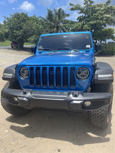 Head-on view of the blue High Tide showing the seven-slot grille and LED headlamps